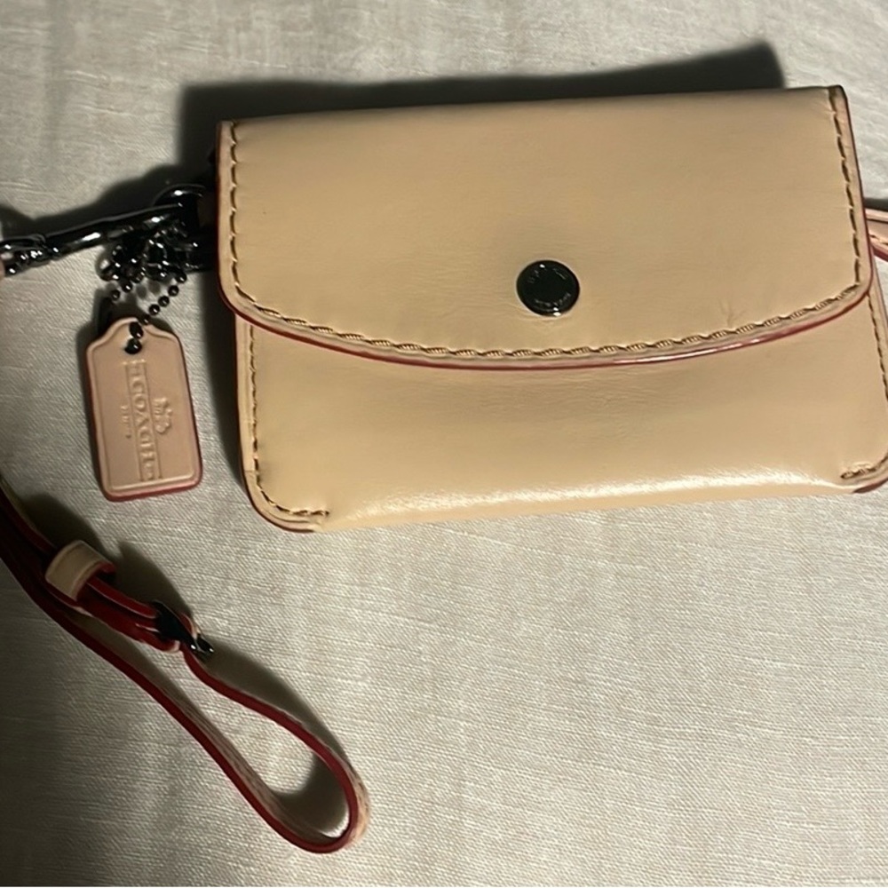 COACH rare wristlet in tan with red contrast. - Picture 2 of 6